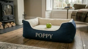 A plush, calming personalised dog bed in a donut shape for anxious pets.