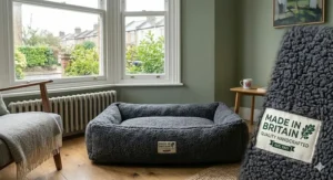 Close-up of a 'Made in Britain' quality label on a soft fleece pet bed.