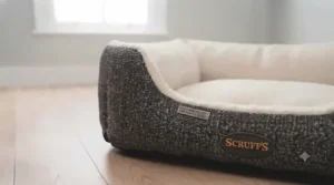 A soft, bolstered crate bed for a puppy that provides a sense of security while resting.