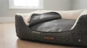 A crate bed for a puppy featuring a waterproof base for easy cleaning during toilet training.