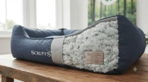Cross-section graphic showing recycled, hypoallergenic filling inside a sustainable anti-microbial dog bed.